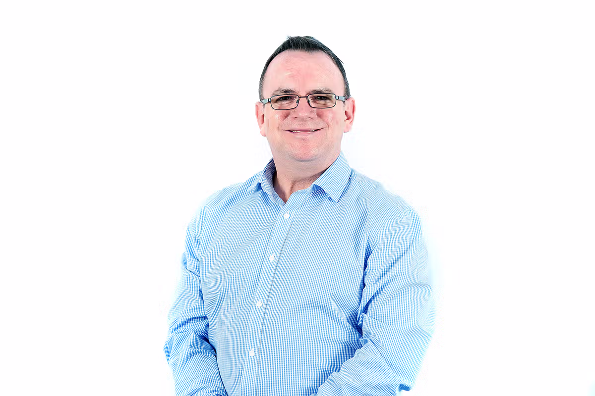 Staff headshot for internal directory and communications use