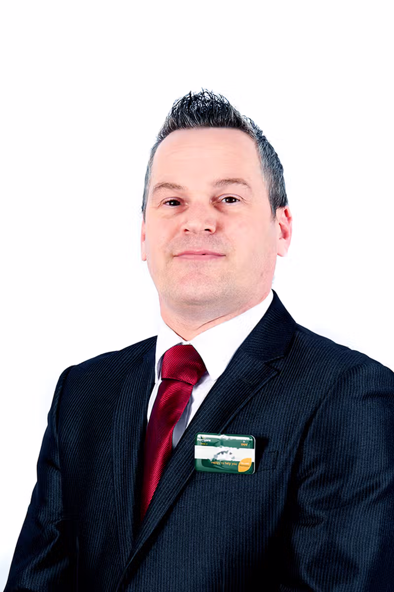White background business headshot for company wide portrait consistency
