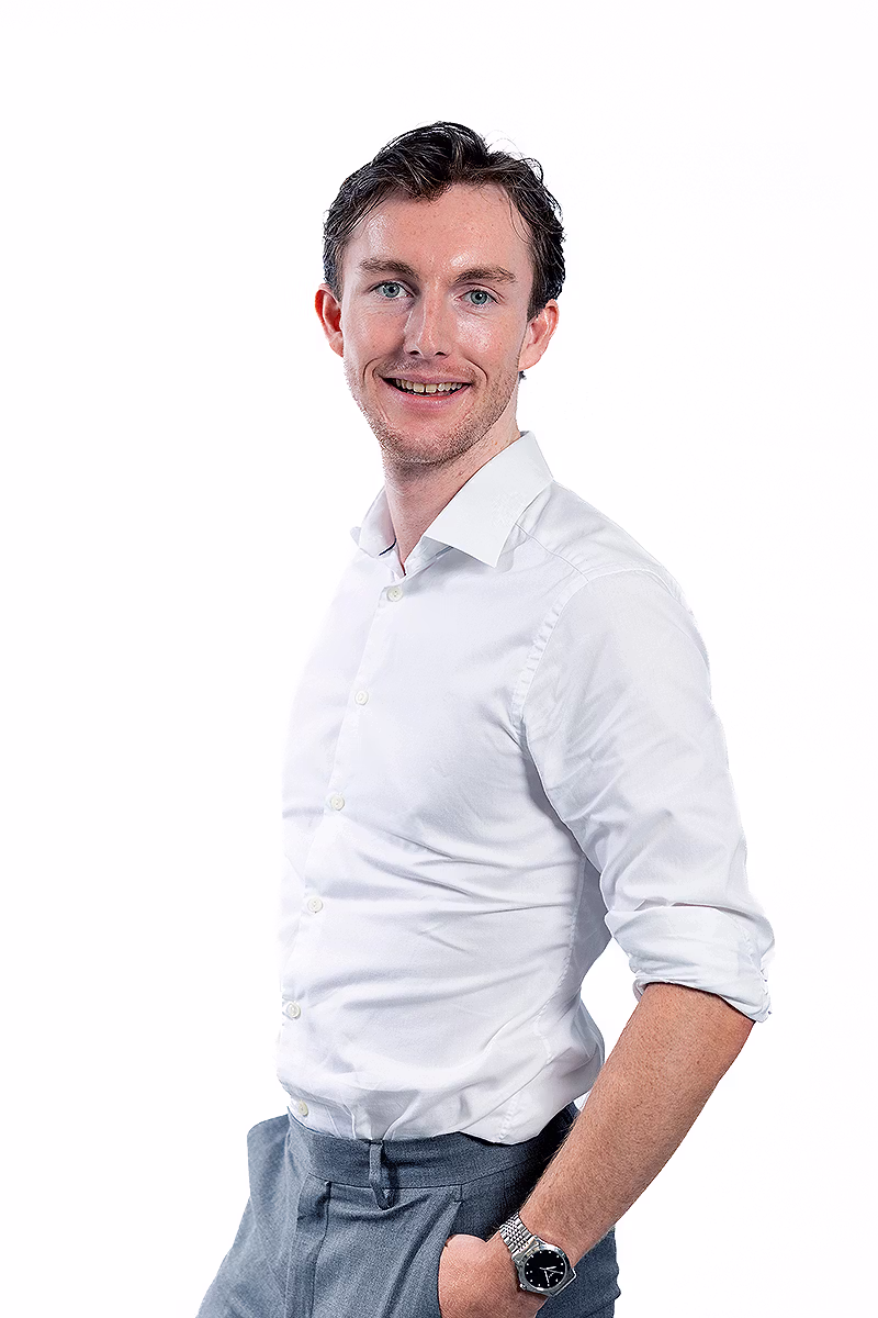 Corporate headshot photographer delivering consistent staff portraits for corporate teams