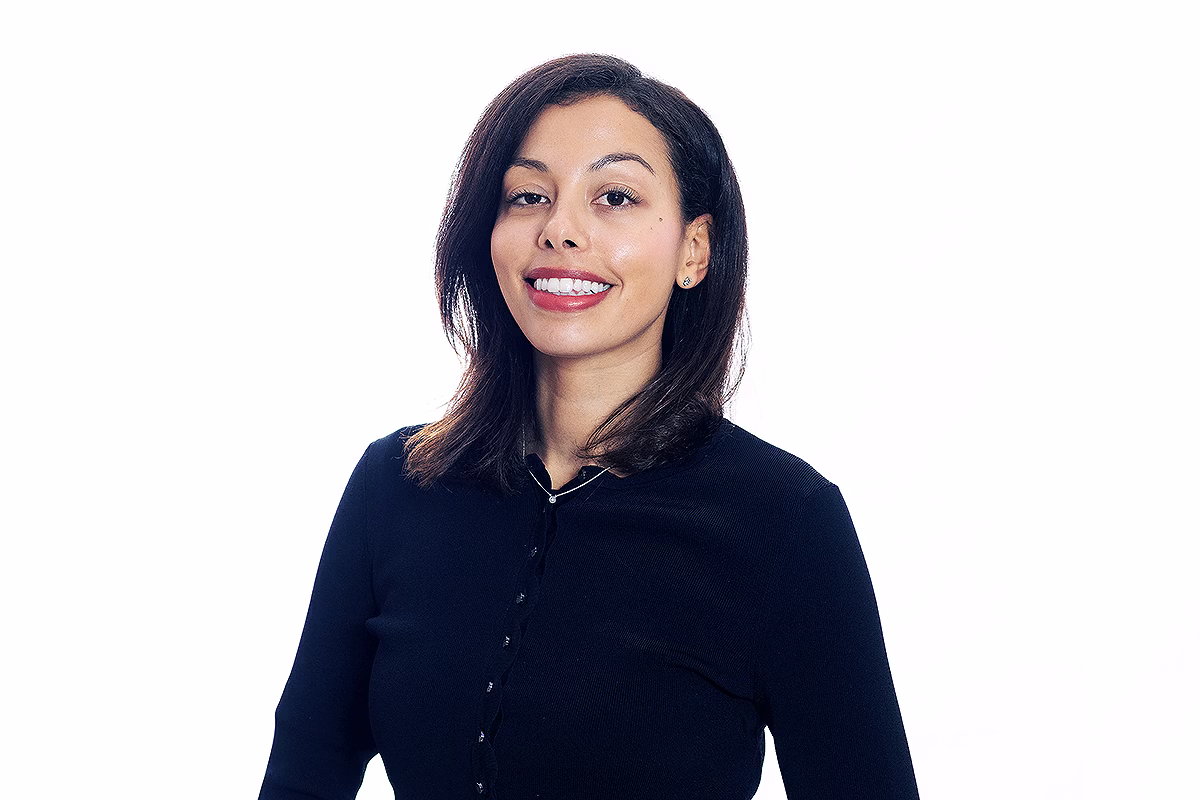 Corporate headshot photographer producing a professional portrait for internal communications