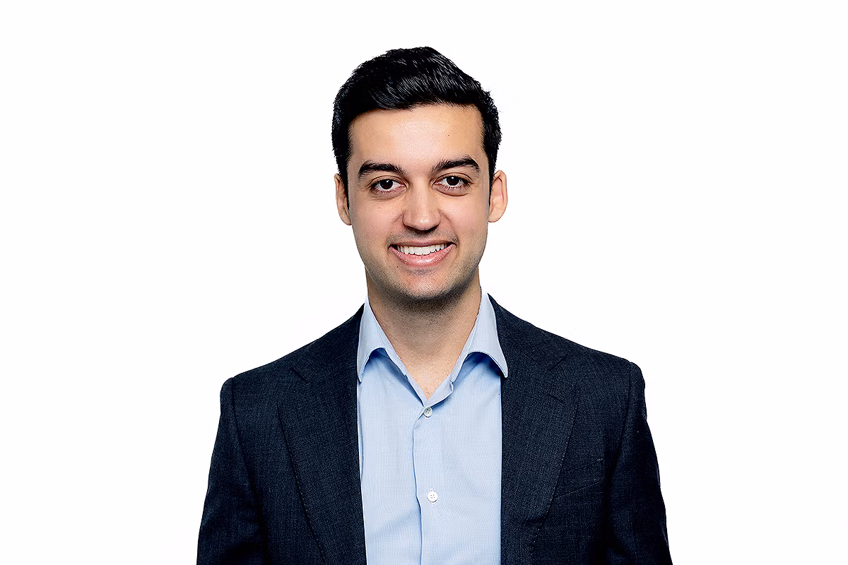 Corporate headshot photographer creating a high-end business portrait for leadership teams