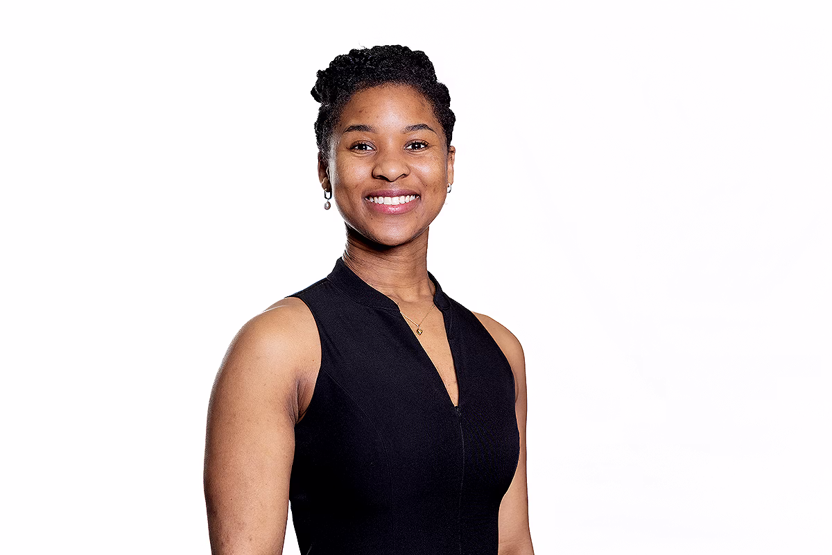 Corporate headshot photographer producing a natural and confident staff headshot