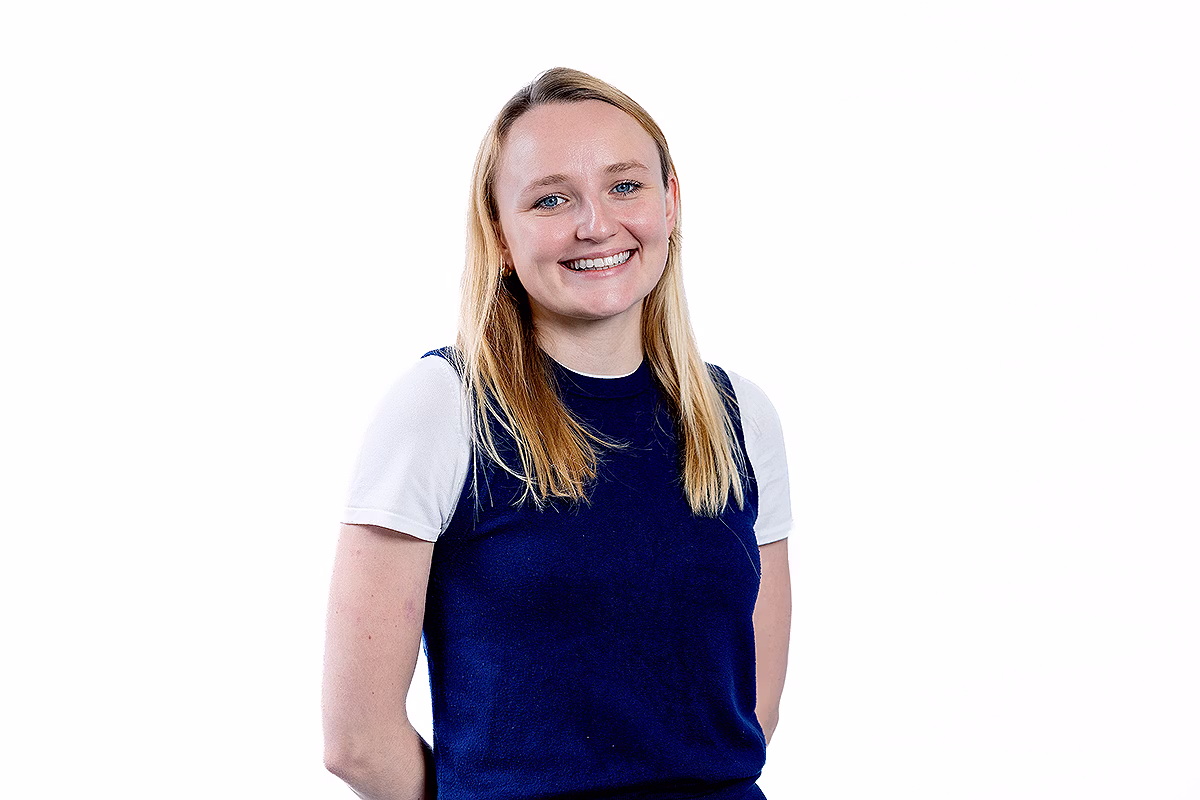 Corporate headshot photographer producing a professional portrait for internal communications