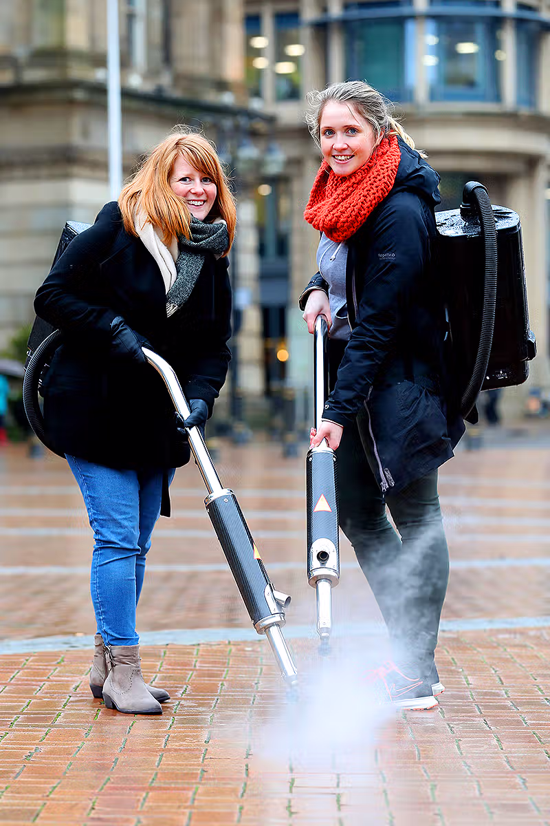 Portrait-format event photographer image captured during a live corporate business event